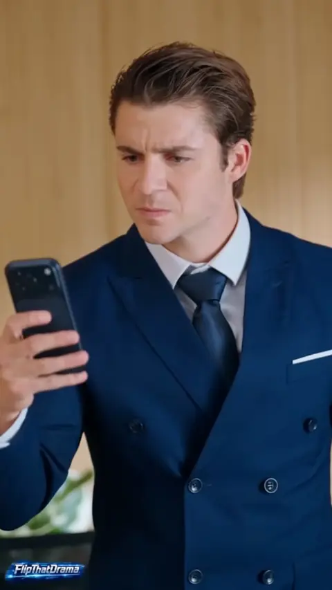 Navy double-breasted suit with a navy tie, still at 49:11 in Boss, Your Secretary Is Gone