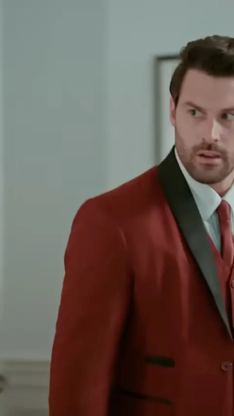 Burgundy tuxedo jacket with a black shawl lapel, in Always Been Mine