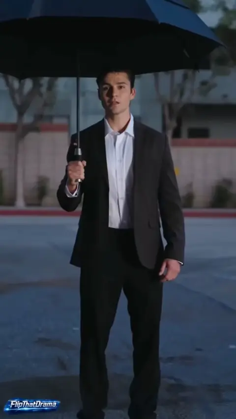 Black suit with an open-collar white shirt, in Boss, Your Secretary Is Gone