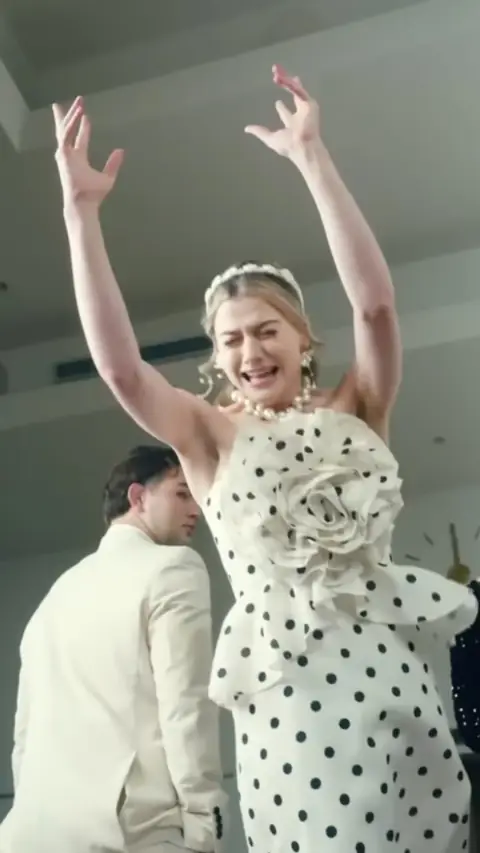 White polka-dot strapless rosette dress with pearls, in The Mafia King's Sweet Wife