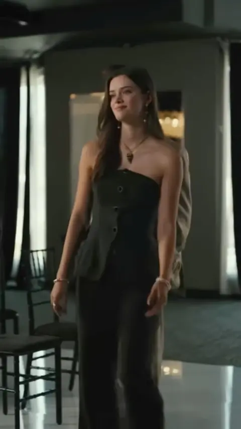 Black strapless button-front top with wide-leg trousers, in Mocked as Poor, She Revealed as Mafia Queen