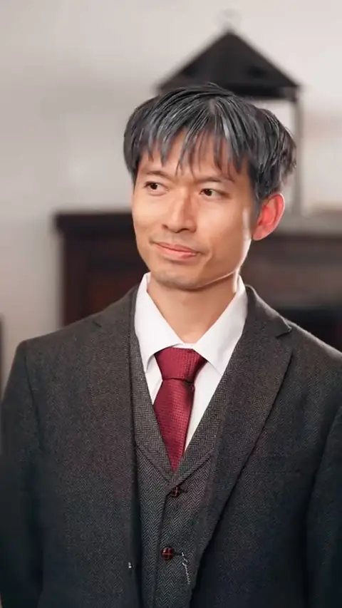 Grey herringbone three-piece suit with a red tie, still at 1:33:33 in My Mechanic Husband Is a Hidden Billionaire