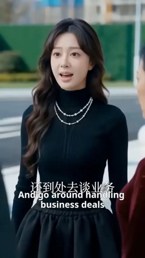 Black ribbed turtleneck, pearls and a full skirt, in The Bride They Mocked Owns Their Bank