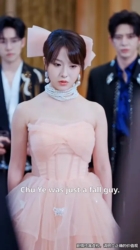 Blush tulle corset dress with pearl choker and hair bow, in Playboy CEO Forced to Marry Ugly Woman, Unaware She's a Mafia Queen