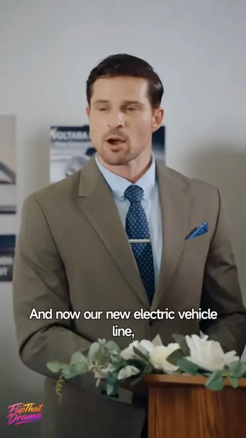 Taupe suit with a navy polka-dot tie, in My Homeless Mafia Husband