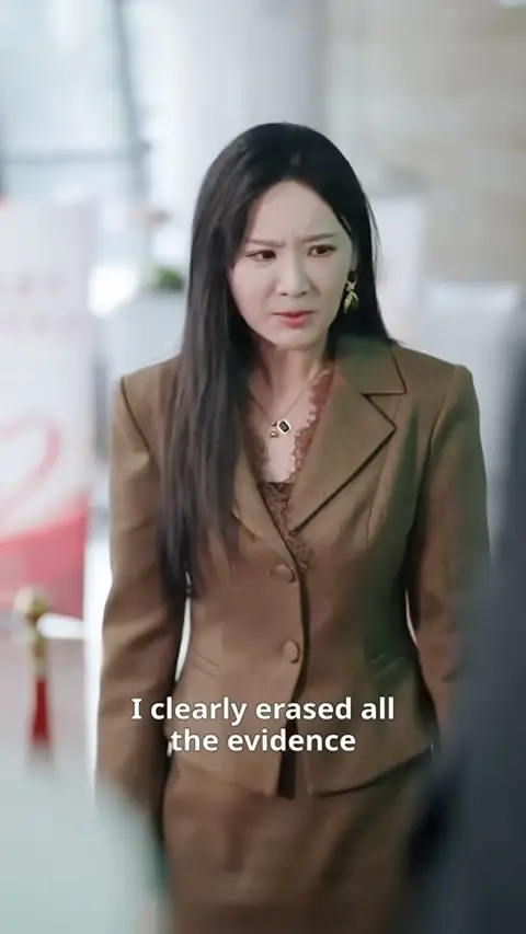 Brown trimmed blazer over a lace top, in The CEO Refused to Marry, Until He Met the Cleaner Who Found His Ring