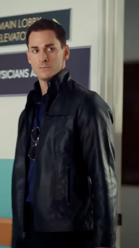 Black leather jacket over a navy tee, in Accidentally Married the Mafia Boss