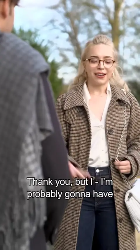 Houndstooth wool coat, white shirt, dark jeans and quilted bag, in The Prince's Forbidden Heiress