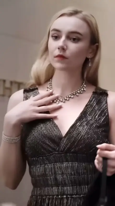 Black metallic pleated V-neck dress with crystal necklace, in Ordinary Cleaner Turns Into a Beauty and Shocks Everyone