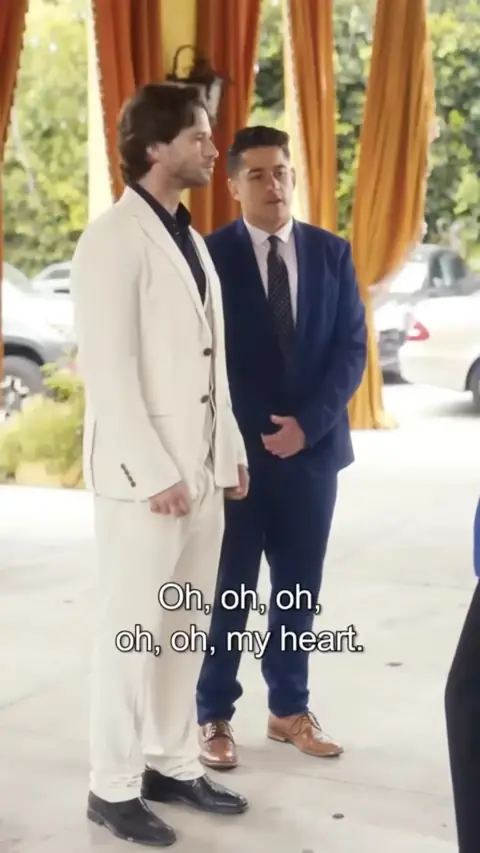 White three-piece suit and a navy suit, in From Lost Heiress to Mafia Queen