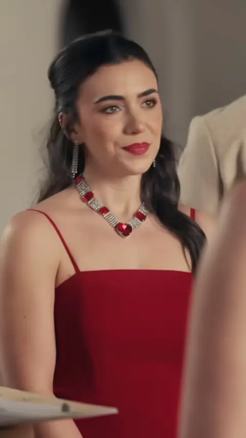Red slip dress with a ruby crystal necklace, still at 43:15 in Ex-Husband Step Aside, Lady Boss Returns