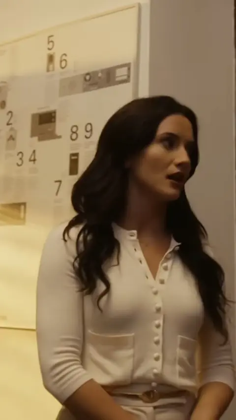 White button-front knit cardigan top, still at 59:42 in The Bullied Office Maid Was the CEO's Real Fiancée
