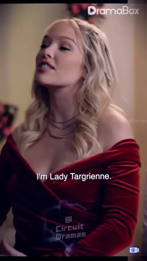 Red velvet off-shoulder top with layered gold chains, in She Married a Homeless CEO