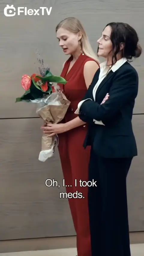Red wrap jumpsuit and a navy blazer suit, in Begging Me Back Home: From Maid to Billionaire's Beloved Heiress