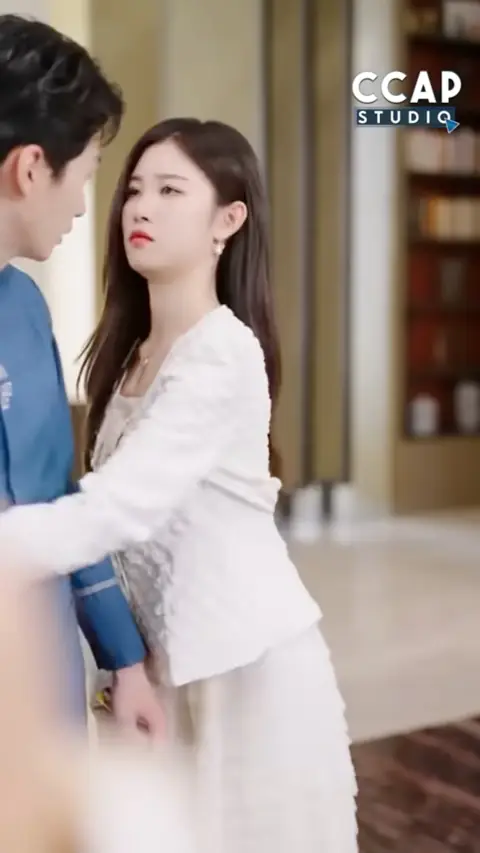 White textured jacket over a sequin top and white skirt, still at 31:29 in Billionaire Wife Pretended to Be a Poor Mechanic for 3 Years