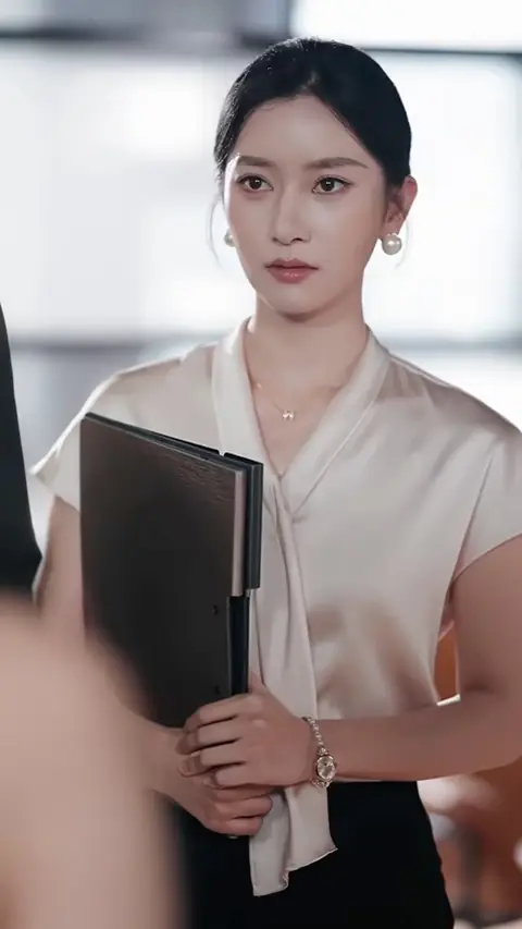 Ivory satin bow blouse with pearl earrings and watch, in The CEO Refused to Marry, Until He Met the Cleaner Who Found His Ring