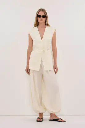 EMORY CREAM COLLARLESS PEPLUM VEST from Dissh