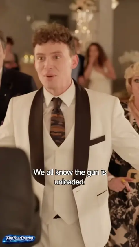 White shawl-lapel tuxedo jacket with vest and patterned tie, in The Mafia King at His Wife's Wedding